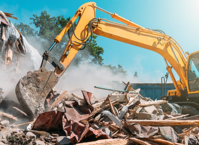 Demolition,Of,Building.,Excavator,Breaks,Old,House.,Freeing,Up,Space